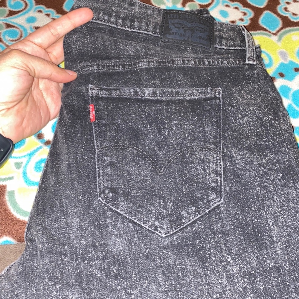 Black acid wash Levi jeans